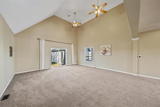 unfurnished living room featuring carpet flooring, ceiling fan, and high vaulted ceiling