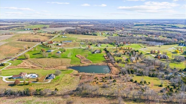 aerial view featuring a rural view and a water view