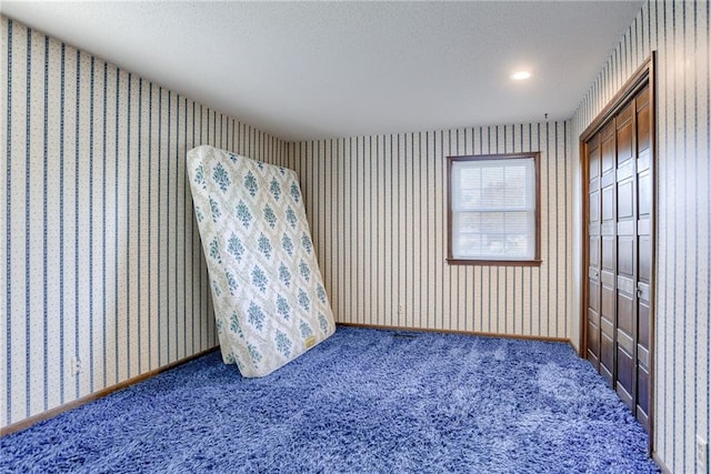 spare room with carpet flooring