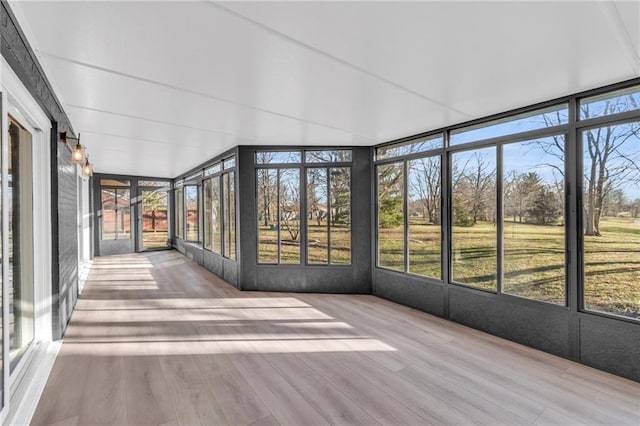 unfurnished sunroom with a healthy amount of sunlight