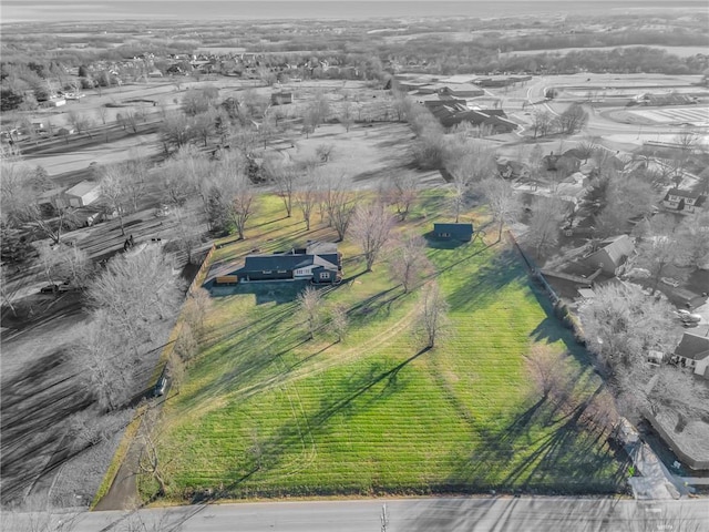 birds eye view of property with a rural view