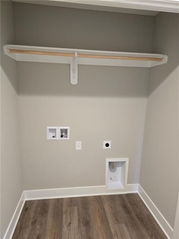 laundry area with dark hardwood / wood-style flooring, washer hookup, and hookup for an electric dryer