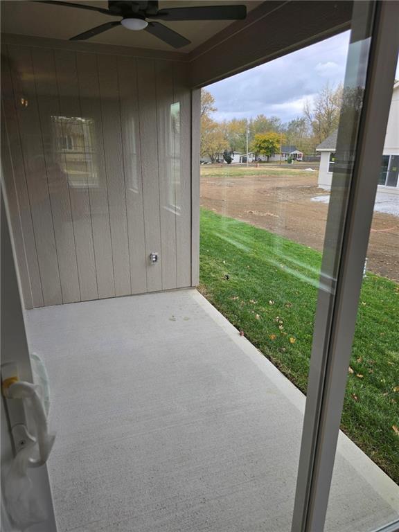 view of patio featuring ceiling fan