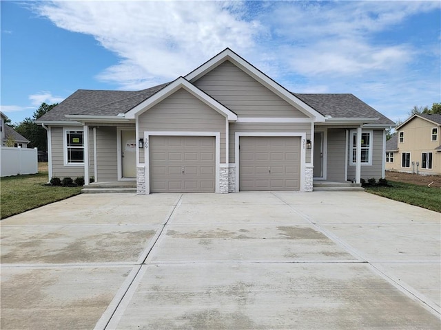 craftsman house with a garage