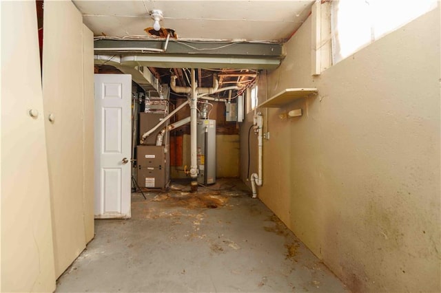 basement with gas water heater and heating unit