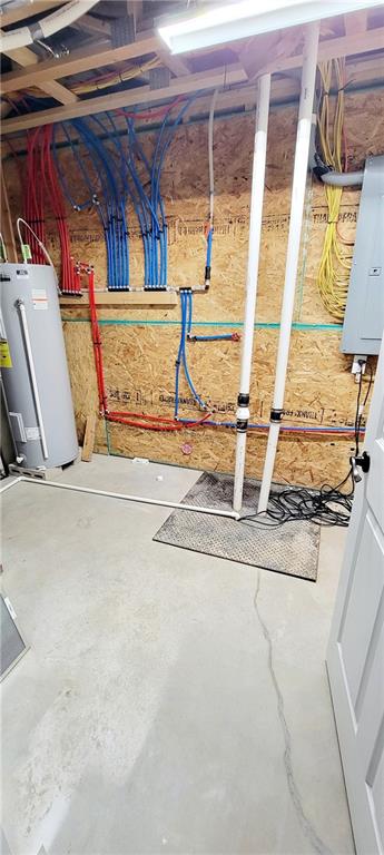 basement featuring water heater