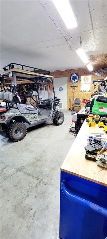 garage featuring a workshop area