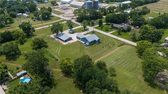 birds eye view of property featuring a rural view