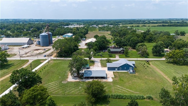 birds eye view of property featuring a rural view