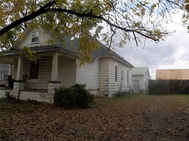 view of home's exterior featuring covered porch