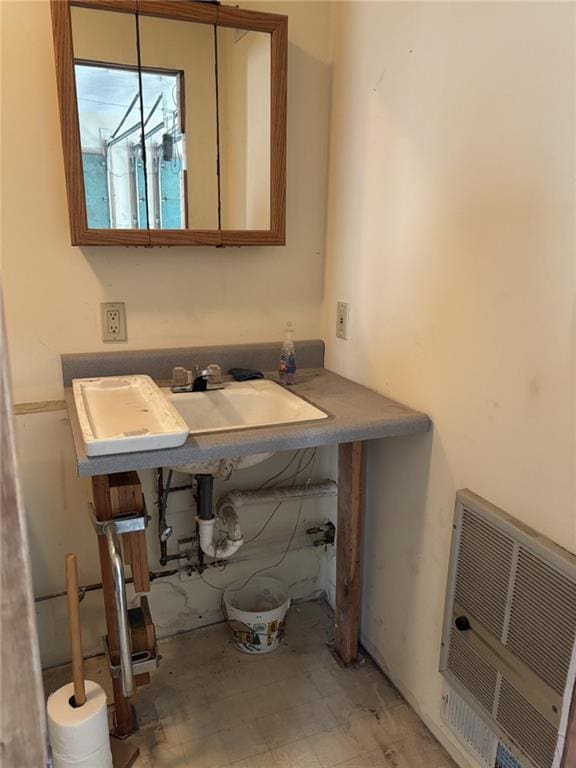 bathroom with heating unit