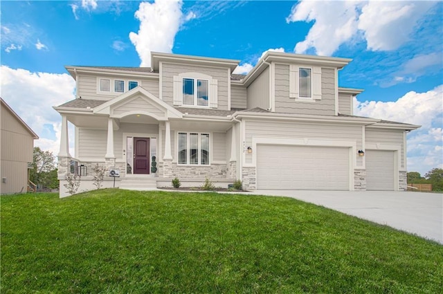 view of front facade featuring a garage and a front yard