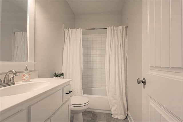 full bath with shower / bath combo with shower curtain, vanity, and toilet