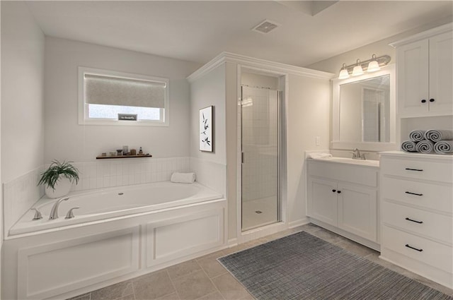 full bath featuring a bath, visible vents, tile patterned flooring, a shower stall, and vanity