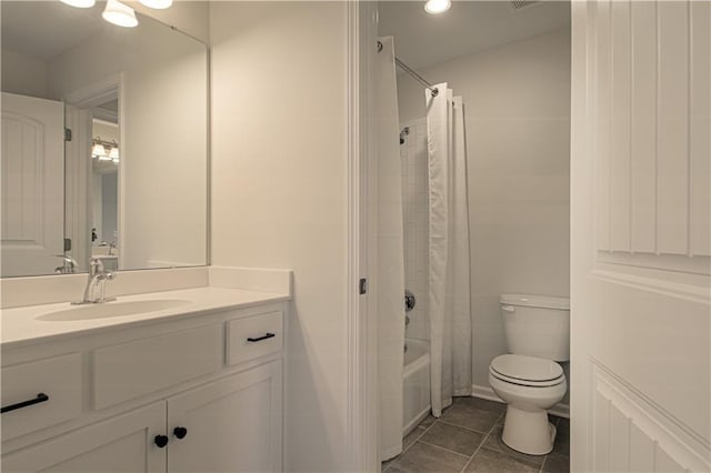 full bath with vanity, shower / bath combination with curtain, toilet, and tile patterned flooring