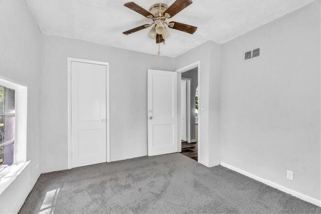 9043 Walnut St, Kansas City, MO 64114 - unfurnished bedroom with carpet and a ceiling fan