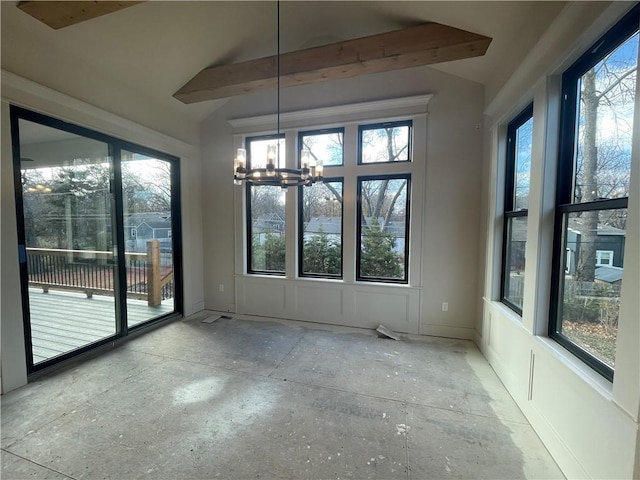 unfurnished dining area with beamed ceiling and a chandelier