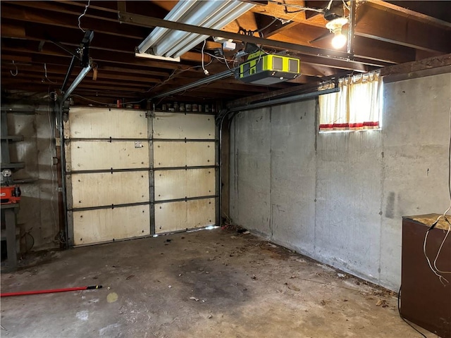 garage featuring a garage door opener