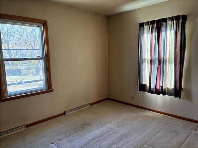 spare room with light carpet