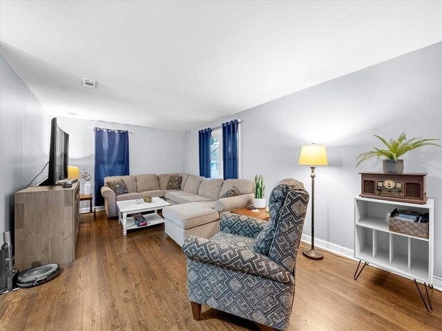 9317 Gillette St, Lenexa, KS 66215 - living area featuring wood finished floors