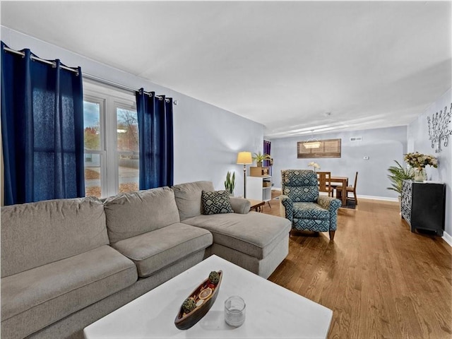 9317 Gillette St, Lenexa, KS 66215 - living room with wood finished floors and baseboards