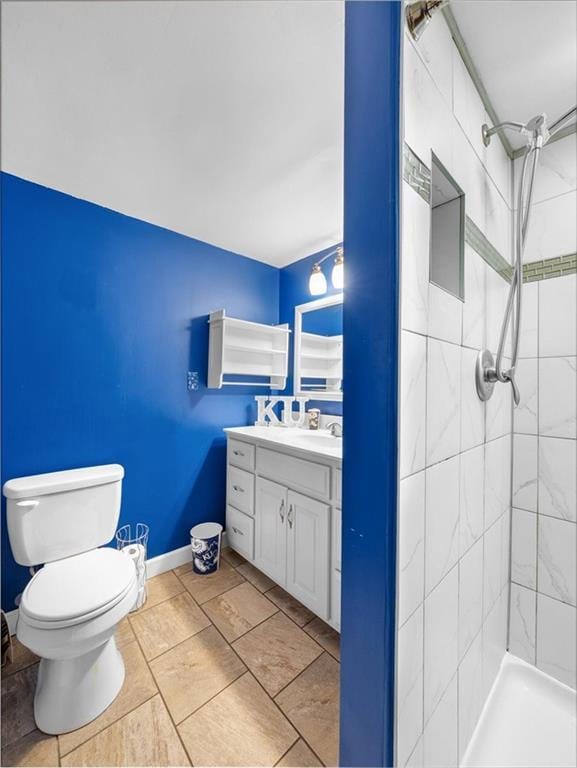 9317 Gillette St, Lenexa, KS 66215 - bathroom with vanity and tiled shower