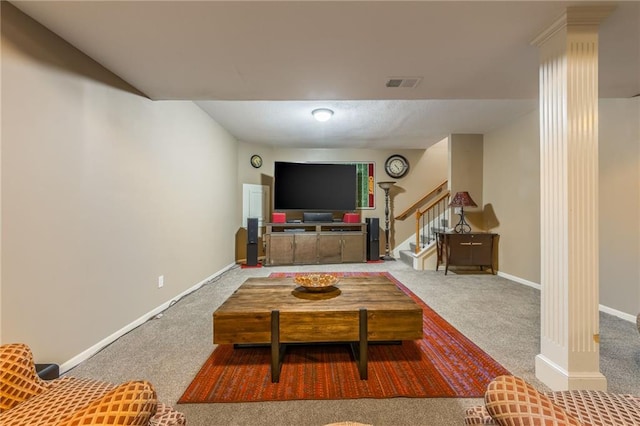 living room with carpet floors and decorative columns