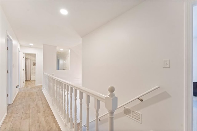 hallway featuring light hardwood / wood-style floors