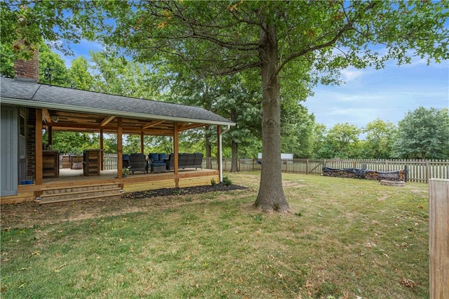 view of yard with an outdoor hangout area and a wooden deck