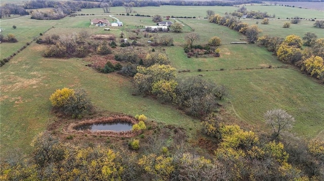 drone / aerial view with a rural view and a water view