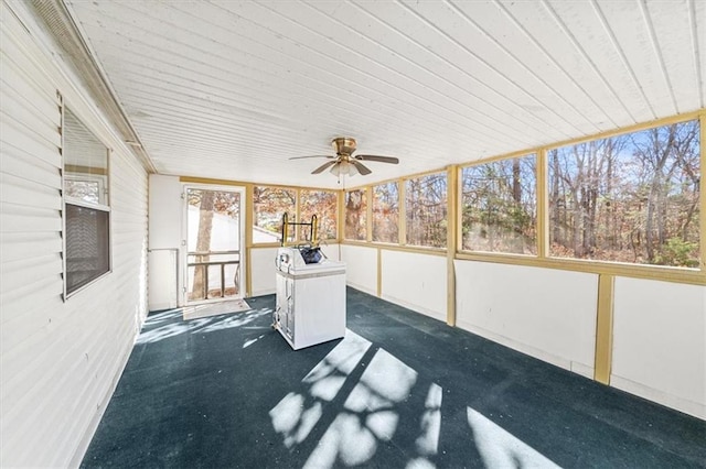 unfurnished sunroom with wooden ceiling