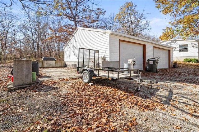 view of outbuilding featuring a garage