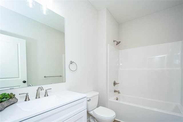 full bathroom featuring shower / washtub combination, toilet, and vanity