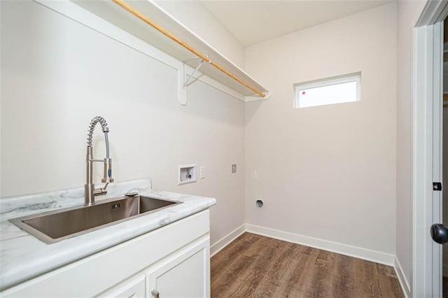 laundry room with cabinets, hookup for a washing machine, sink, and dark wood-type flooring