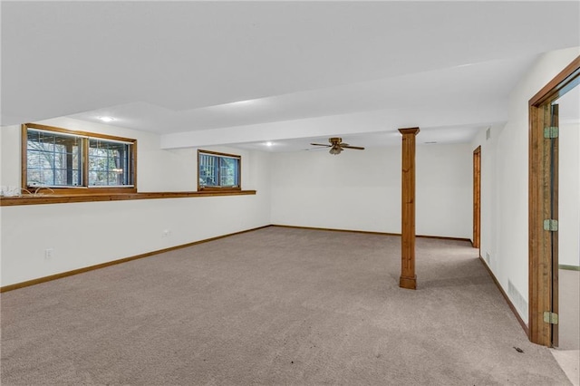 interior space with light carpet and ceiling fan