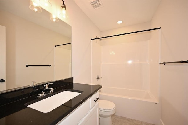 full bathroom featuring shower / bath combination, vanity, and toilet