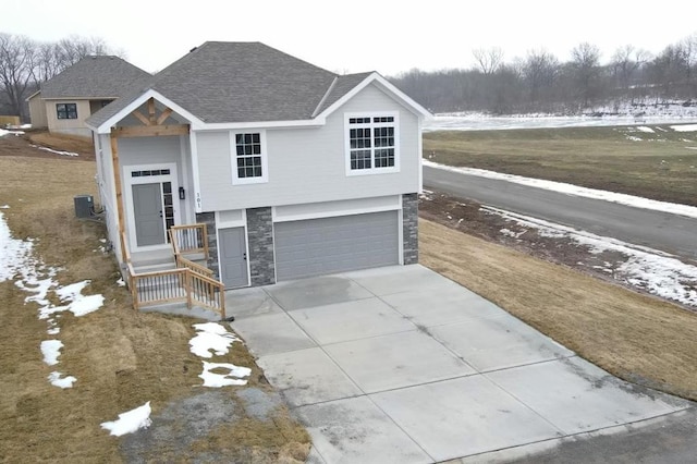 raised ranch featuring a garage