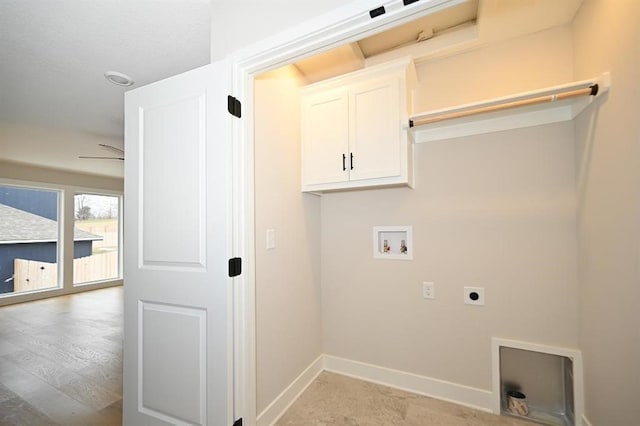 clothes washing area with cabinets, hookup for a washing machine, and electric dryer hookup