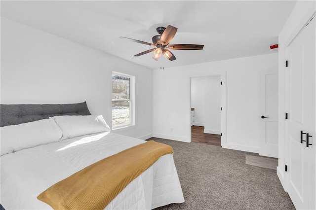 carpeted bedroom featuring ceiling fan