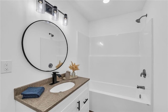 bathroom with vanity and tub / shower combination