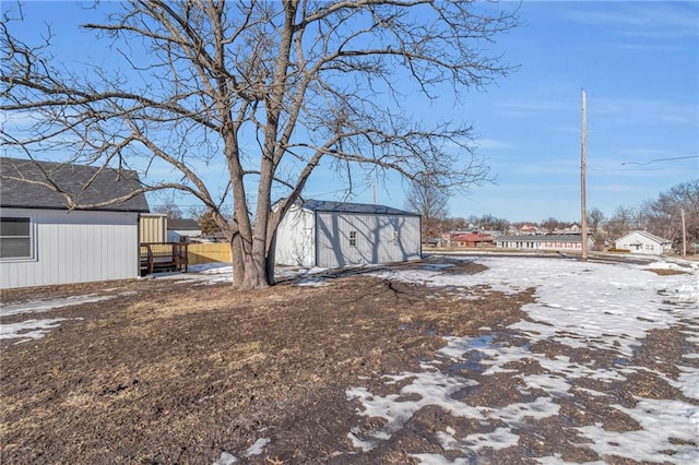 view of yard covered in snow