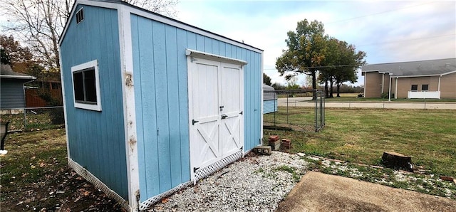 view of outdoor structure featuring a yard