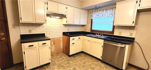 kitchen featuring tasteful backsplash, white cabinetry, dishwasher, and sink