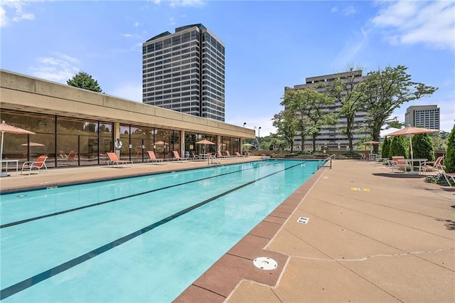 community pool featuring a patio area