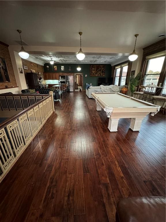 game room with dark wood-type flooring and billiards