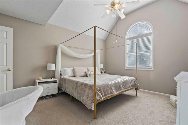 carpeted bedroom featuring ceiling fan and lofted ceiling