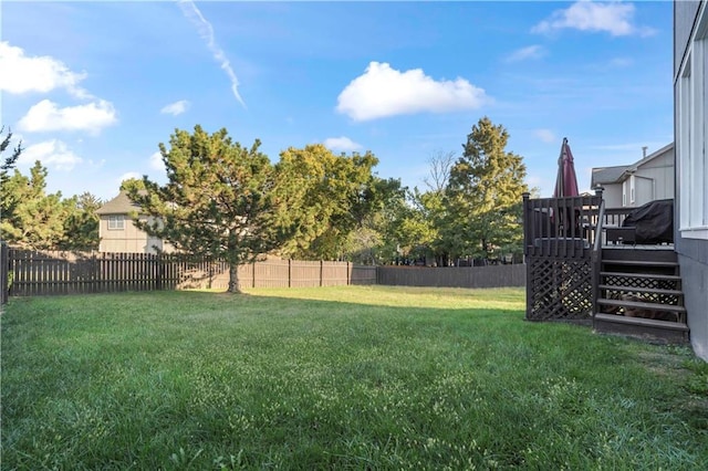 view of yard featuring a deck