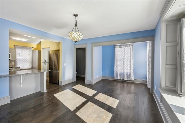 interior space with dark hardwood / wood-style flooring