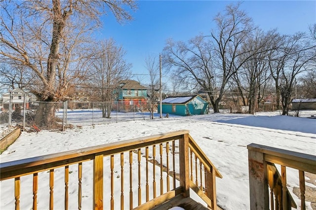 view of snow covered deck