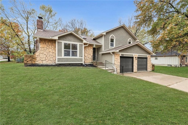 view of front of house with a front lawn and a garage